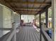 Covered front porch with rocking chairs and decor at 3050 Old Soldier Rd, Lakeland, FL 33810