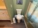 Toilet located next to vanity and adjacent to shower at 3050 Old Soldier Rd, Lakeland, FL 33810