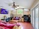 Versatile bonus room perfect for a home office, with a view of the pool from the window at 3158 Forest Breeze Way, St Cloud, FL 34771