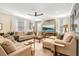 Comfortable living room with plush seating, stylish decor, and natural light at 31792 Broadwater Ave, Leesburg, FL 34748