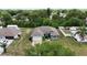 Aerial view of a single-Gathering home with a two-car garage and a spacious yard at 3390 George Sauls St, Deltona, FL 32738