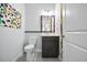 Colorful powder room with modern sink and fixtures at 3390 George Sauls St, Deltona, FL 32738
