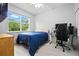 Cozy bedroom with natural light and a comfortable setup at 3390 George Sauls St, Deltona, FL 32738