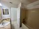 Bathroom featuring a vanity, sink and a shower/tub combo next to the toilet at 343 Marquee Dr, Kissimmee, FL 34758