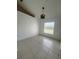 Bedroom with tile flooring, ceiling fan, and large window at 343 Marquee Dr, Kissimmee, FL 34758