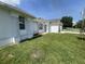 Exterior view of a home with well-maintained lawn and landscaping at 343 Marquee Dr, Kissimmee, FL 34758