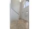 Inviting foyer with tile flooring, a staircase and large windows at 364 Fish Hawk Dr, Winter Haven, FL 33884