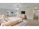 Bright bedroom with a comfortable bed, natural light, and simple, modern decor at 364 Fish Hawk Dr, Winter Haven, FL 33884