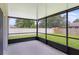 Enclosed patio provides an enjoyable view of the fenced yard at 364 Fish Hawk Dr, Winter Haven, FL 33884