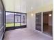 Screened patio overlooking the backyard, with sliding door access to the interior at 364 Fish Hawk Dr, Winter Haven, FL 33884