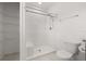 Bathroom featuring a tiled shower with a bench and glass door at 371 Pinecrest Loop, Davenport, FL 33837