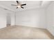 Bedroom featuring a ceiling fan, a window, carpet, and white walls at 371 Pinecrest Loop, Davenport, FL 33837