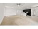 Open concept living room to kitchen with carpet and tile flooring at 371 Pinecrest Loop, Davenport, FL 33837