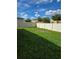 Expansive backyard with lush green grass, perfect for entertaining and outdoor relaxation at 3839 Marbella Way, Davenport, FL 33897