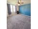 Cozy bedroom with a ceiling fan and large windows letting in plenty of light at 3839 Marbella Way, Davenport, FL 33897