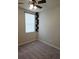 Bedroom with natural light, wall shelves and neutral carpet at 3839 Marbella Way, Davenport, FL 33897