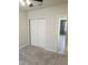 Bedroom featuring a closet with double doors, carpet flooring and natural light at 3839 Marbella Way, Davenport, FL 33897