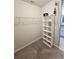 Walk-in closet with wire shelving and carpet at 3839 Marbella Way, Davenport, FL 33897