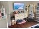Cozy bedroom with warm wood floors, stylish furnishings, and ample natural light at 421 Bridle Path, Casselberry, FL 32707