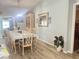 Formal dining room featuring a table with eight chairs and stylish chandelier at 421 Bridle Path, Casselberry, FL 32707