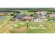 Beautiful aerial view of community amenities, golf course, and clubhouse, perfect for recreation at 4928 Cortland Dr, Davenport, FL 33837