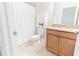 Clean bathroom with vanity, granite counters, tub/shower with decorative shower curtain at 4928 Cortland Dr, Davenport, FL 33837