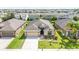 Lovely single Gathering home featuring a well-manicured lawn, two-car garage, and neutral color palette at 4928 Cortland Dr, Davenport, FL 33837