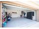 Two car garage featuring a full wall of storage and room for a workshop at 4928 Cortland Dr, Davenport, FL 33837