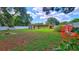 Expansive backyard with lush lawn, perfect for outdoor activities and entertaining at 518 Oranole Rd, Maitland, FL 32751