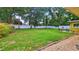 Backyard features a well-maintained lawn, ideal for outdoor enjoyment and relaxation at 518 Oranole Rd, Maitland, FL 32751
