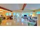Spacious living area with natural light, polished floors, and sliding glass doors leading to the outside at 518 Oranole Rd, Maitland, FL 32751
