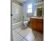 Full bathroom featuring a tub and shower combination and a tiled floor at 5230 Clarion Oaks Dr, Orlando, FL 32808