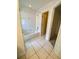 Bathroom offers a shower and bathtub combo and tiled floors at 5230 Clarion Oaks Dr, Orlando, FL 32808