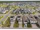 A high shot of homes in a neighborhood all with solar panels on the roofs at 6522 Rover Way, St Cloud, FL 34771