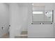 Modern bathroom with a tiled shower, a glass enclosure, and sleek black fixtures at 6522 Rover Way, St Cloud, FL 34771