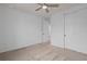 Neutral bedroom featuring a ceiling fan, carpet, and a closet for functional living at 6522 Rover Way, St Cloud, FL 34771