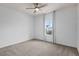 Cozy bedroom with a ceiling fan and a window to let natural light in at 6522 Rover Way, St Cloud, FL 34771