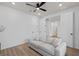 Cozy living room with a comfortable sofa, offering a relaxing space for residents and guests at 6522 Rover Way, St Cloud, FL 34771
