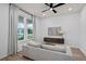 Contemporary living room featuring large windows, a comfortable sofa, and tasteful decor at 6522 Rover Way, St Cloud, FL 34771