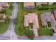 Aerial view showing the house, tile roof, lawn, and landscaping of property at 730 Villa Park Rd, Poinciana, FL 34759
