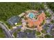 Aerial view of the community's pool and surrounding area at 730 Villa Park Rd, Poinciana, FL 34759