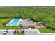 Community clubhouse featuring a large pool, playground, and recreational facilities, perfect for Gathering activities at 746 Stonewyk Way, Kissimmee, FL 34744
