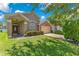 Beautiful curb appeal showcasing the well-maintained lawn and charming single-Gathering home at 746 Stonewyk Way, Kissimmee, FL 34744