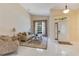 Inviting living room with large windows and a tiled floor, perfect for relaxation and enjoyment at 746 Stonewyk Way, Kissimmee, FL 34744