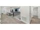 Spacious loft area with comfortable seating, a large tv, and access to multiple bedrooms at 9126 Sommerset Hills Dr, Davenport, FL 33896