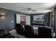 Enjoyable media room with large screen and comfortable seating at 9126 Sommerset Hills Dr, Davenport, FL 33896