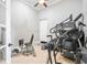 Well-equipped home gym with various exercise machines for a comprehensive workout experience at 9905 Lanai View Ct, Windermere, FL 34786
