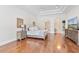 Light and bright main bedroom with hardwood floors and trey ceilings throughout at 9905 Lanai View Ct, Windermere, FL 34786