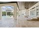 Inviting outdoor living area with a pool, screened enclosure, and comfortable seating at 9905 Lanai View Ct, Windermere, FL 34786
