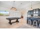 Stylish game room and wet bar area with billiard table, recessed lighting, and tiled flooring at 9905 Lanai View Ct, Windermere, FL 34786